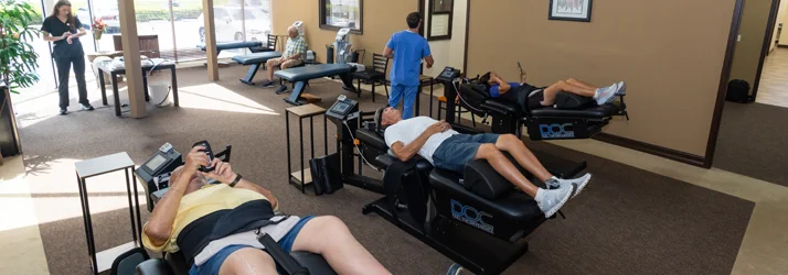 Spinal Decompression Naples FL Patients Using Tables Patients at Johnston Spinal Care using decompression tables